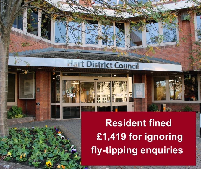 Front entrance of Hart District Council building with a caption that reads: 'Resident fined £1,419 for ignoring fly-tipping enquiries.'